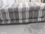 photo partielle d'un matelas en laine